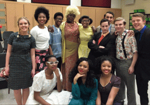 The cast of “Hairspray” poses in costume. “Hairspray” is showing this weekend at WCHS. 