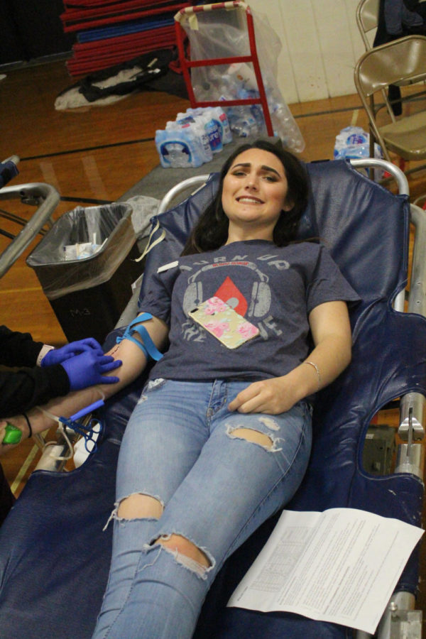 Senior Bianca Adams gives blood at last years Blood Drive. 
