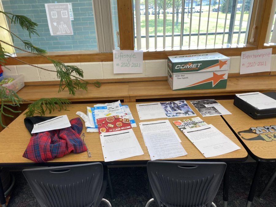 Mrs. Shteiwis Sociology class prepared a display of items curated to put in a 2021 time capsule to be opened by WCHS students in 2040. This display can be viewed in the library. 